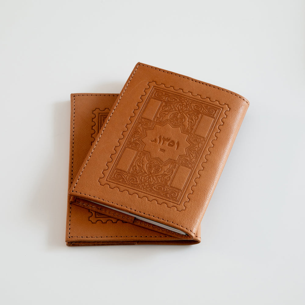 
                      
                        66 - Saudi Stamps Leather Passport Sleeve
                      
                    